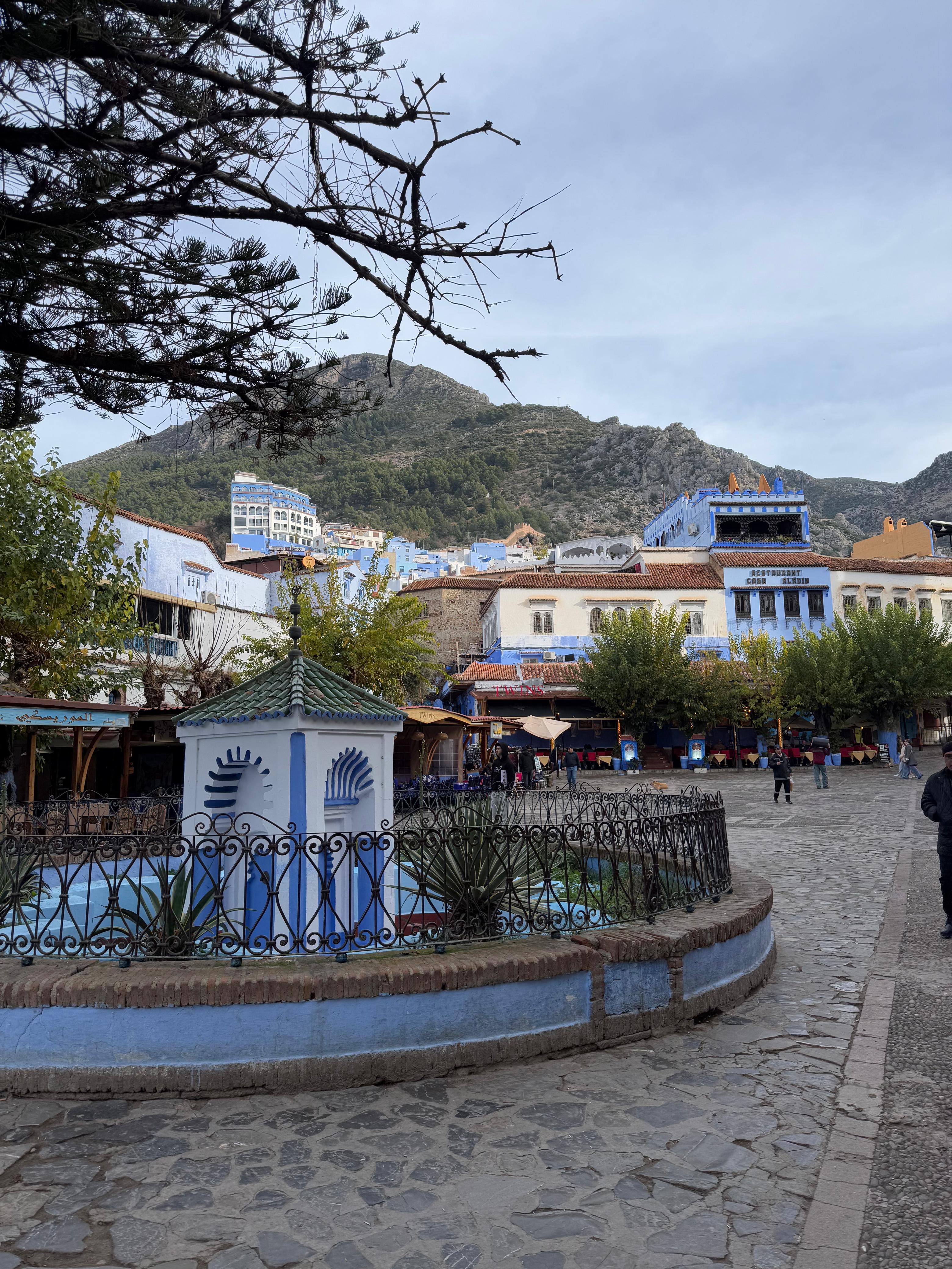 Chefchaouen square and mountains